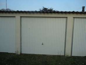 Location Garage box et parking 13 m&sup2;Lion-sur-Mer