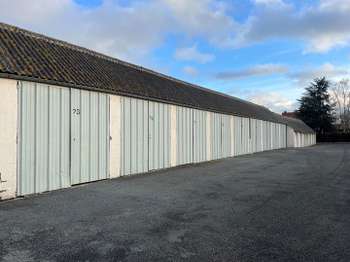 Location Garage box et parking 30 m&sup2;May-sur-Orne