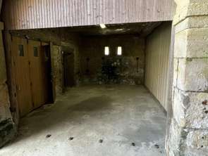 Location Garage box et parking 30 m&sup2;Secqueville-en-Bessin