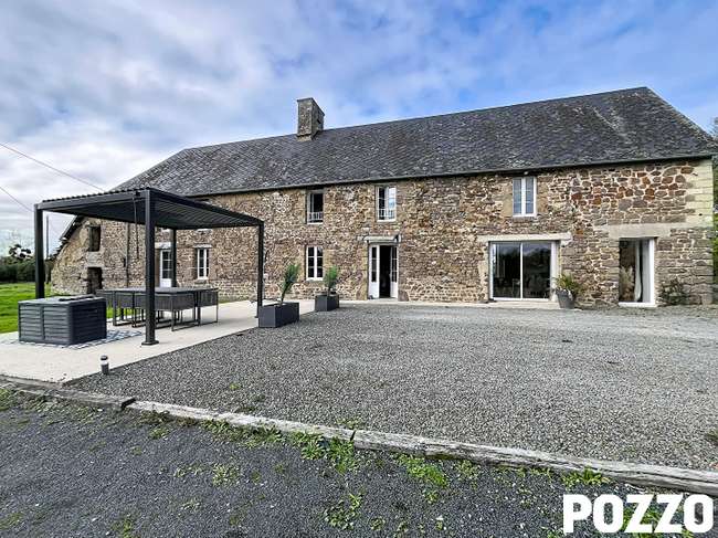 Maison 7 pièces 130 m² · à Moyon Villages · 130 m² · 265 000 €